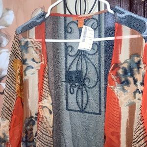 Harari cover up. See through